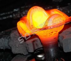 Hot die forged part